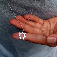 sun charm pendant necklace in silver