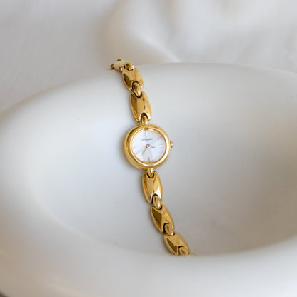 Vintage Marie Claire Slim Round Gold Watch