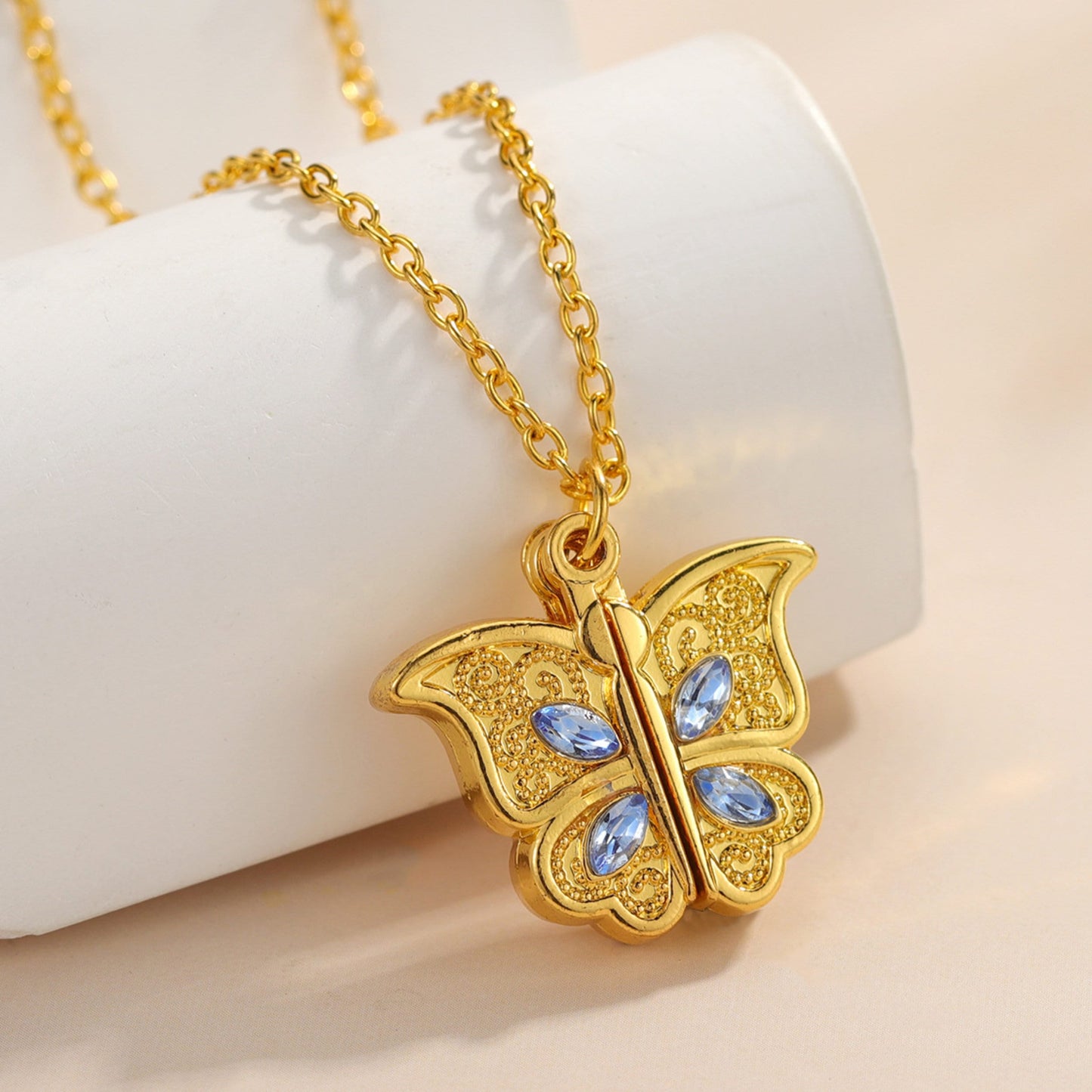 Butterfly locket necklace