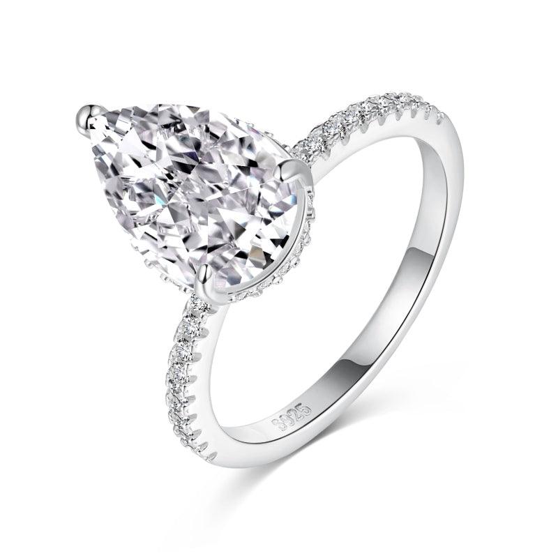 Classic pear cut half pavé band solitaire ring