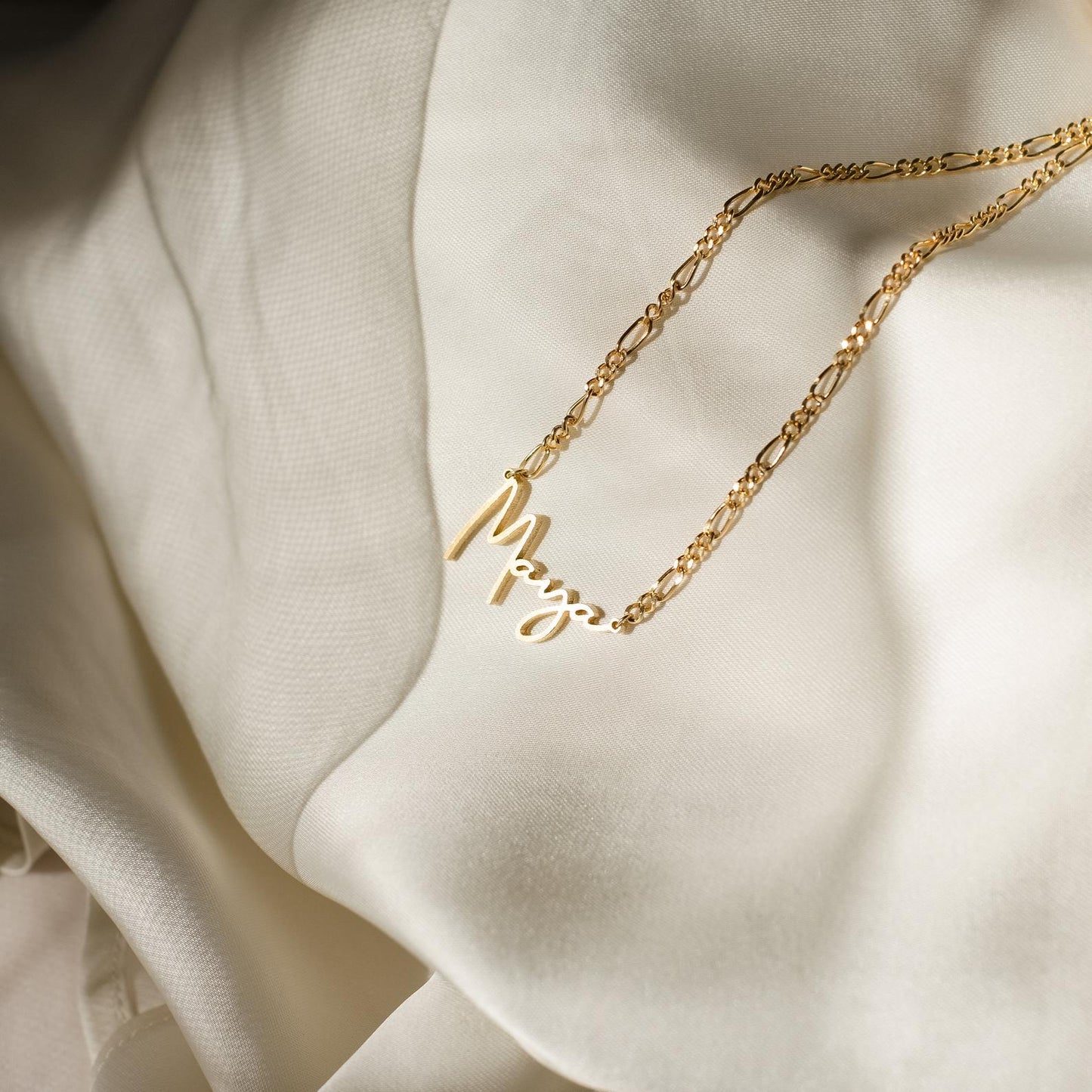 Carrie Name Necklace in Figaro Chain