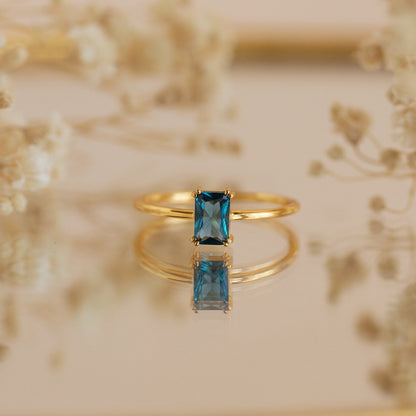 Blue Topaz Emerald Ring