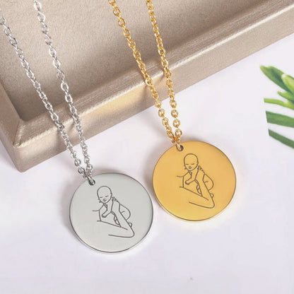 Mother and Angel Baby Necklace